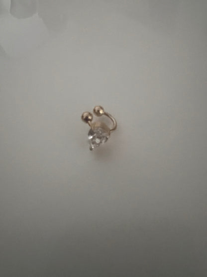 Minipendientes tipo puño para la oreja